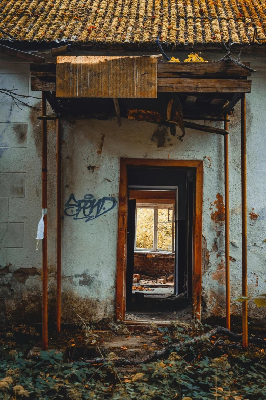 an old run down house with graffiti on the walls, pexels contest winner, doorways, rust, instagram photo, demolition