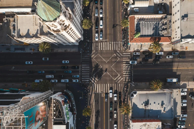 an aerial view of a busy city street, by Carey Morris, pexels contest winner, square, hollywood, high quality image, thumbnail