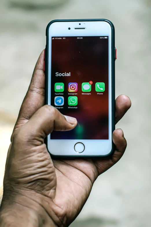 a close up of a person holding a cell phone, by Sam Dillemans, sri lanka, apple, square, 15081959 21121991 01012000 4k