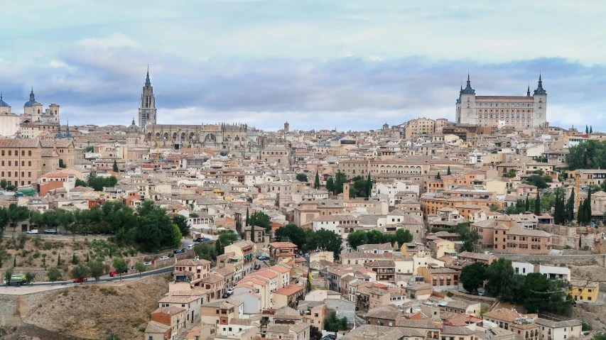 a view of a city from the top of a hill, by Juan Giménez, pexels contest winner, baroque, square, zurbaran, beige, high resolution photograph