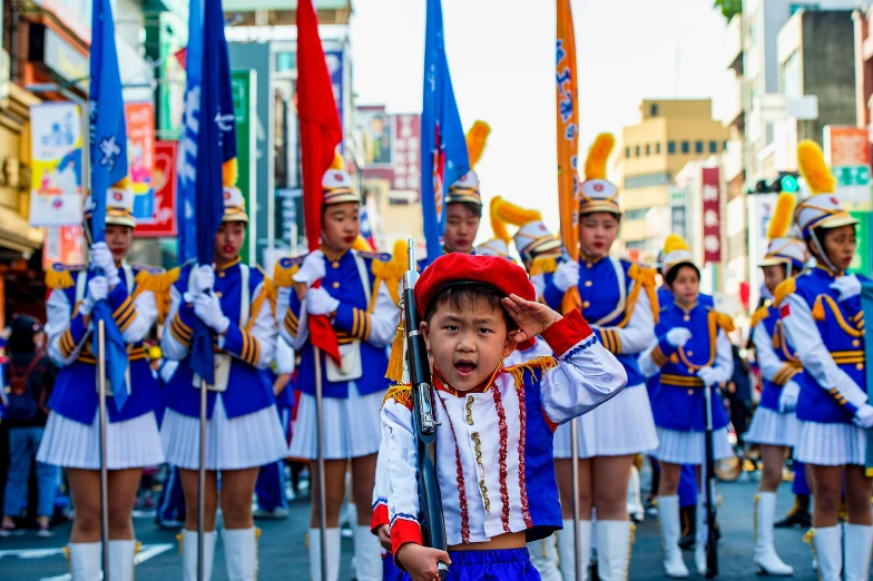 a little boy that is standing in the street, an album cover, by Bernardino Mei, pexels contest winner, cloisonnism, army parade glorious march, bow ashigaru, taiwan, avatar image