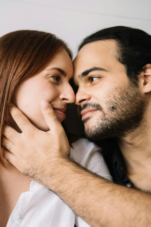 a man and a woman looking into each other's eyes, trending on pexels, renaissance, cuddly, two male, hispanic, ( redhead