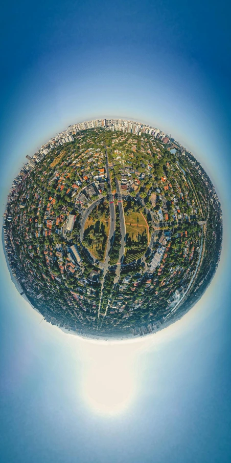 a small planet view of a city on a sunny day, by Sebastian Spreng, 8 k detailed photograph, hdr photo, bird\'s eye view, multiple stories