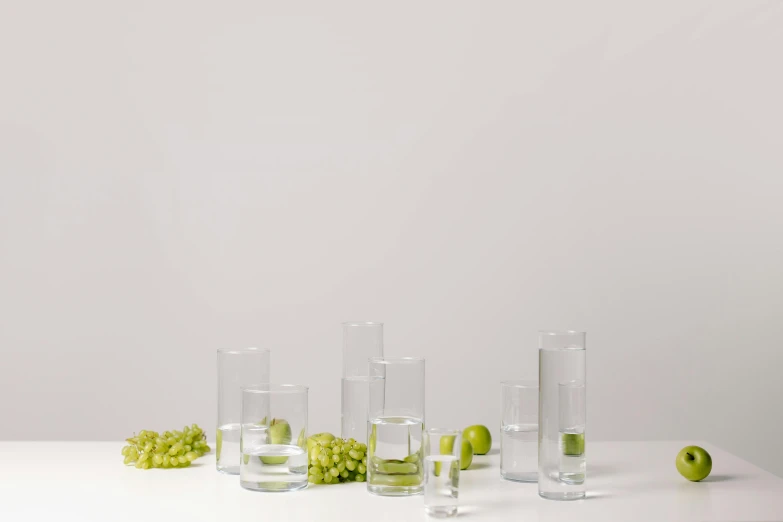 a bunch of glasses sitting on top of a table, a still life, official product photo, clear clean, large tall, handcrafted