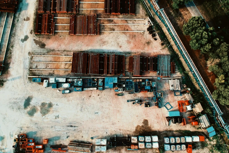 a large group of trucks parked next to each other, unsplash, photorealism, satellite imagery, rusted steel, trading depots, high quality product image”