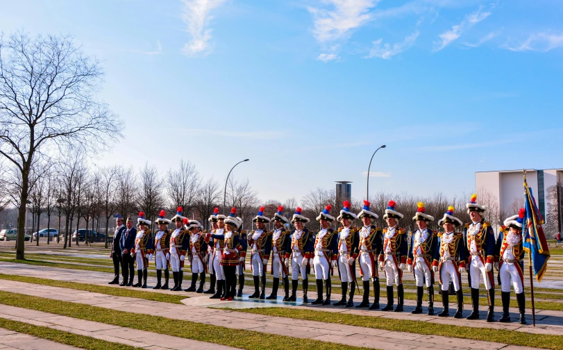 a group of soldiers standing next to each other, by Julia Pishtar, pexels contest winner, frans hals style, sunny day time, wearing presidential band, panorama