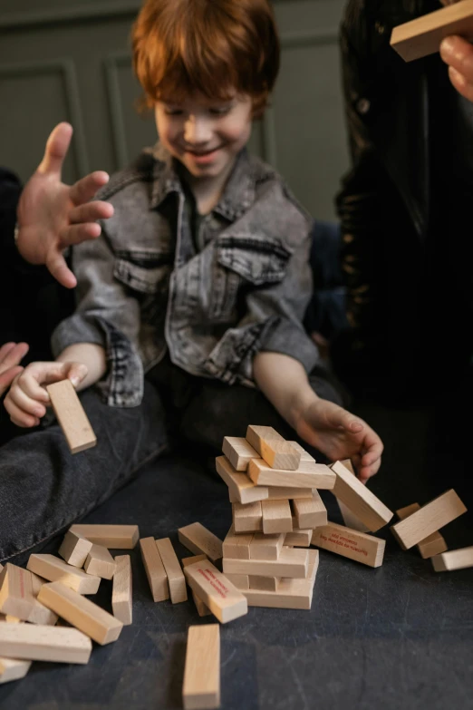 a group of children playing with wooden blocks, by Kristian Zahrtmann, pexels contest winner, videogame still, alessio albi, a still of a happy, hyperdetailed