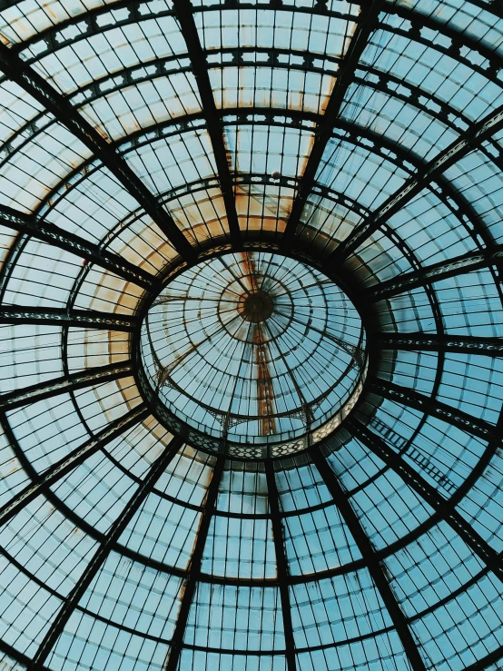 a glass dome with a blue sky in the background, by Kristian Zahrtmann, unsplash contest winner, naples, tall ceilings, promo image, everything enclosed in a circle