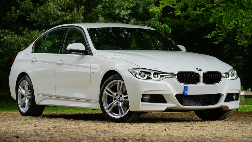 a white bmw car parked on a gravel road, pexels contest winner, 15081959 21121991 01012000 4k, front angle, romantic lead, f 3 2