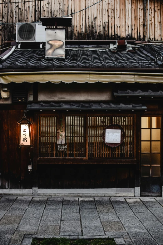 a red fire hydrant sitting in front of a building, a picture, inspired by Watanabe Shōtei, trending on unsplash, ukiyo-e, dimly-lit cozy tavern, seen from outside, grey, storefront