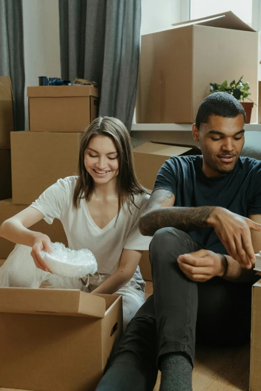 a couple of people sitting on the floor with boxes, profile pic, inspect in inventory image, sydney, thumbnail