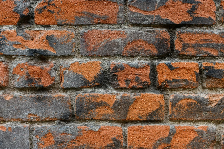 a fire hydrant in front of a brick wall, an album cover, by Jan Kupecký, rock details joints, dark grey and orange colours, detail shot, background image