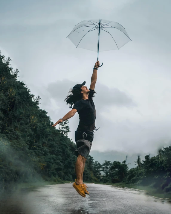 a person jumping in the air with an umbrella, pexels contest winner, asian male, silver lining, an epic non - binary model, wet road