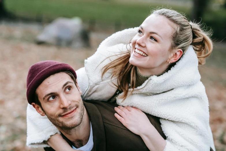 a man carrying a woman on his back, trending on pexels, annasophia robb, warm friendly expression, picnic, sydney park