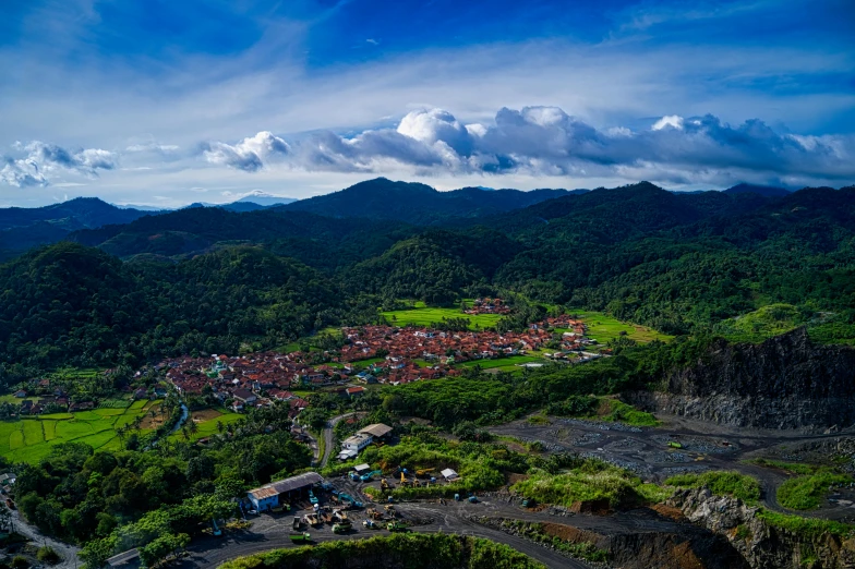an aerial view of a village in the mountains, pexels contest winner, sumatraism, background image, volcanic, puerto rico, thumbnail