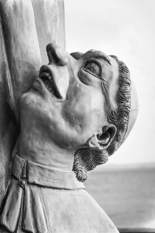 a black and white photo of a statue of jesus, a statue, inspired by Cagnaccio di San Pietro, pexels contest winner, renaissance, nose made of wood, detailed clay model, italo calvino, maurizio cattelan