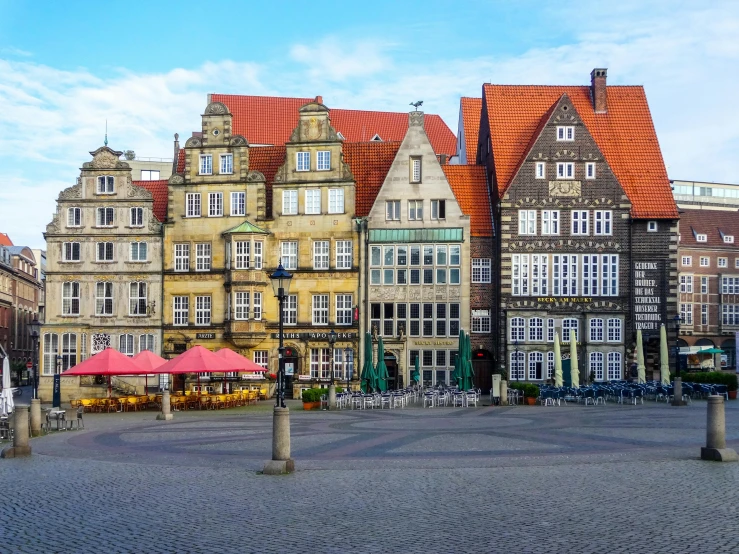 a group of buildings sitting next to each other, by Tom Wänerstrand, pexels contest winner, renaissance, lower saxony, square, 🦩🪐🐞👩🏻🦳, desktop background