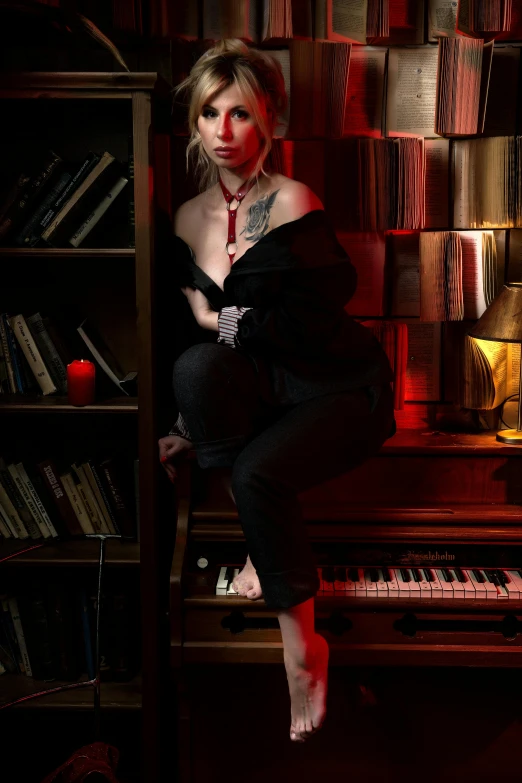 a woman sitting on a piano in front of a bookshelf, an album cover, inspired by Elsa Bleda, featured on reddit, very sexy devil outfit, full body cgsociety, portrait a woman like reol, with a red eyes