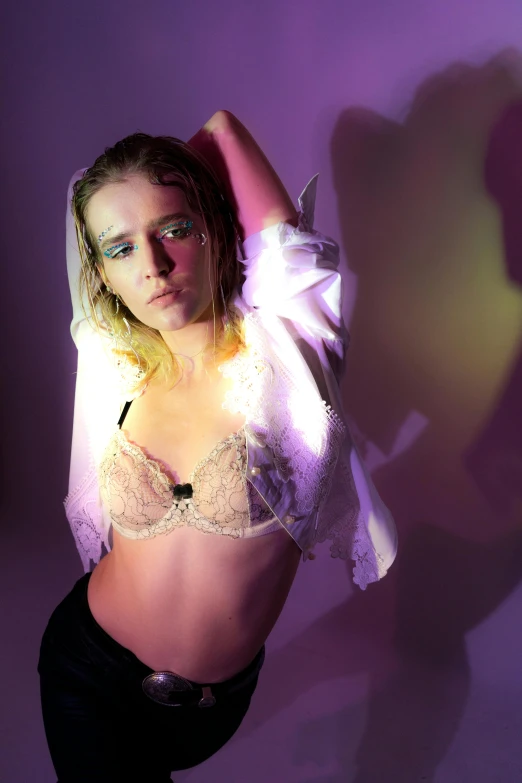 a woman in a white shirt and black pants, an album cover, inspired by Elsa Bleda, holography, wearing pearl neon bikini, with glowing purple eyes, sydney sweeney, low-light photograph