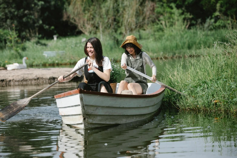 two women in a row boat on a body of water, unsplash, renaissance, lucy hale and maisie williams, bucklebury ferry, gardening, having fun