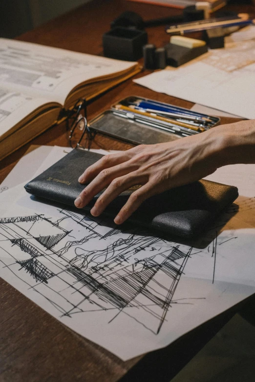 a close up of a person's hand on a piece of paper, a drawing, arts and crafts movement, holding a leather purse, architectural planning, inspect in inventory image, foster and partners