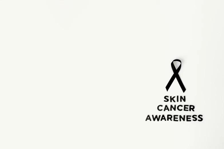 a black and white photo of a sign that says skin cancer awareness, by Emma Andijewska, minimalist logo without text, panoramic shot, serge lutens, illustration:.4