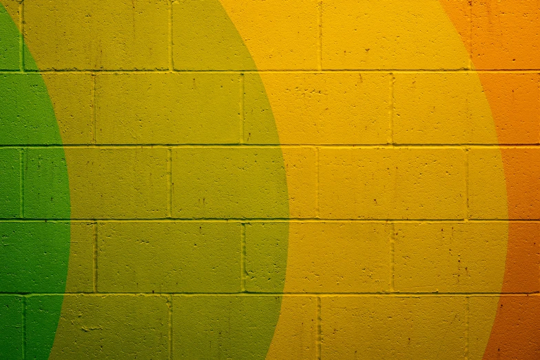 a fire hydrant in front of a colorful wall, a minimalist painting, by Leon Polk Smith, unsplash, yellow and olive color scheme, circles, cement brick wall background, background image