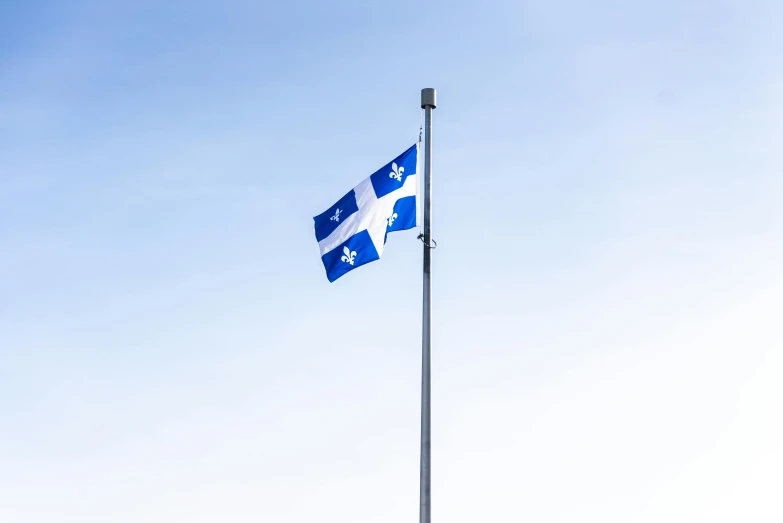 a blue and white flag flying in the sky, quebec, square, profile image, fan favorite