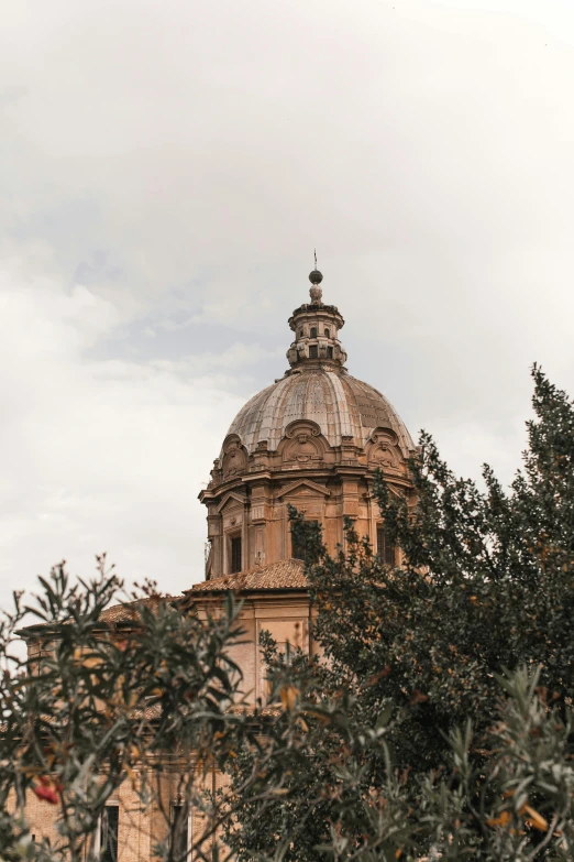 a large building with a clock on top of it, inspired by Pietro da Cortona, trending on unsplash, baroque, olive trees, dome, ivan bolivian, profile image