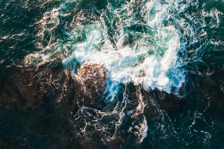 an aerial view of a large body of water, pexels contest winner, happening, ocean spray, thumbnail, turbulent, manly