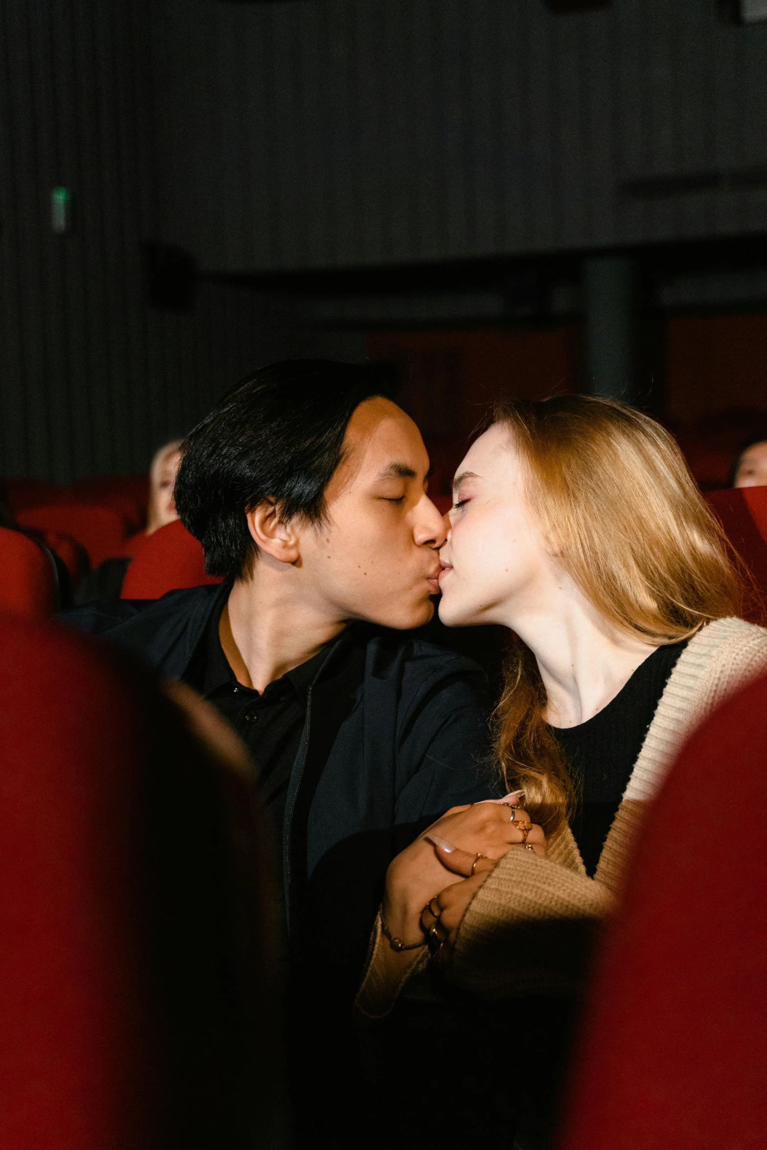 a man and a woman kissing in a movie theater, damien tran, jovana rikalo, high quality upload, julia hetta