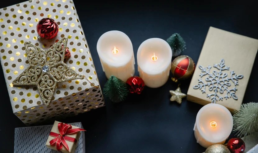 a group of candles sitting on top of a table, gifts, background image, flatlay, multiple stories