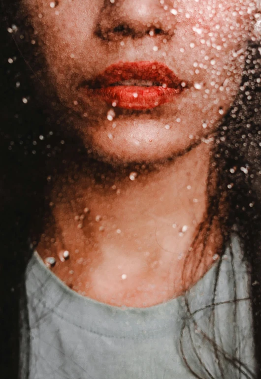 a woman standing in front of a window covered in snow, a picture, inspired by Elsa Bleda, trending on pexels, conceptual art, glossy lips, covered in water drops, grainy. poorly rated, ilustration