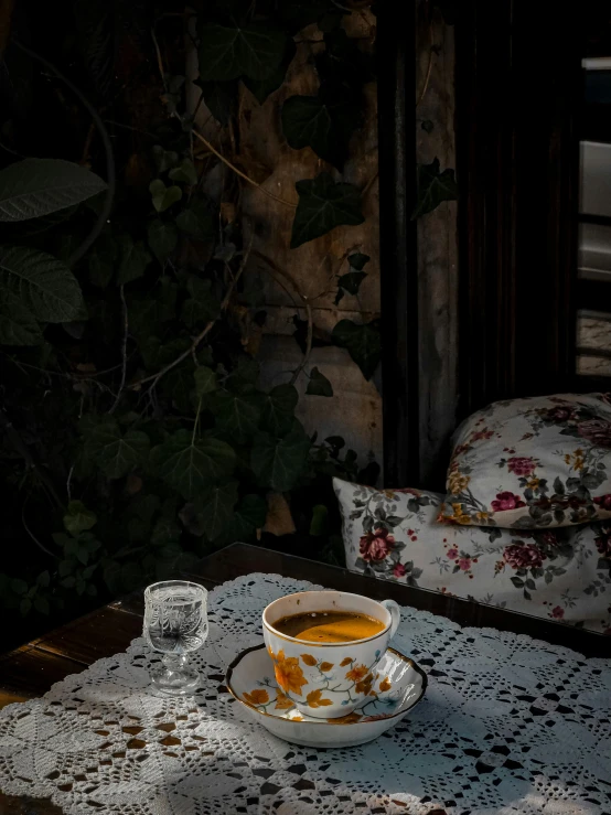 a close up of a plate of food on a table, inspired by Elsa Bleda, romanticism, moroccan tea set, profile image, dark photo