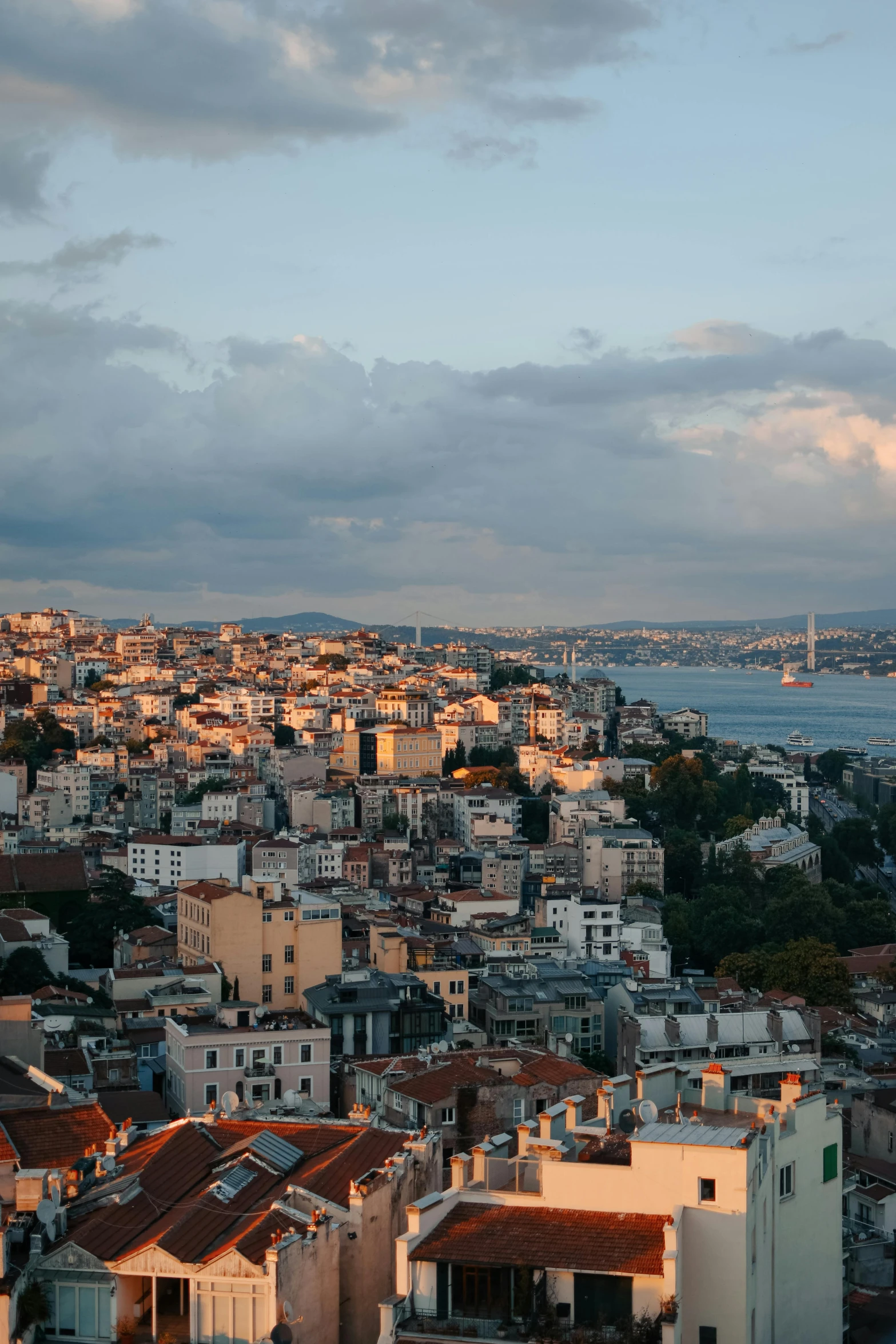 a view of a city from the top of a hill, inspired by Nadim Karam, pexels contest winner, renaissance, fallout style istanbul, beautiful late afternoon, slide show, staggered terraces