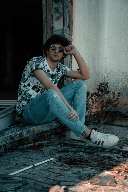 a man sitting on the ground next to a fire hydrant, pexels contest winner, aestheticism, finn wolfhard, with sunglass, jeans and t shirt, profile picture 1024px