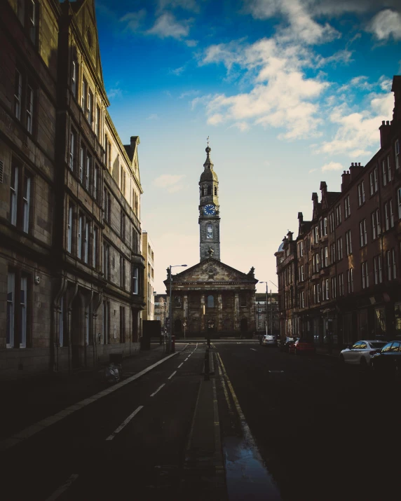 a clock tower towering over a city street, by IAN SPRIGGS, pexels contest winner, baroque, scottish style, non-binary, cinematic”, 2 0 0 0's photo