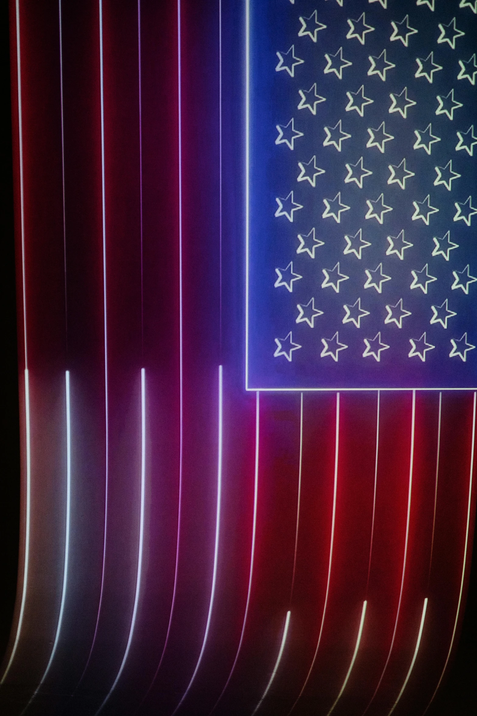 an american flag with red, white and blue lights, an album cover, inspired by Richard Anuszkiewicz, pexels, ultrafine detail ”, neon electronic signs, medium closeup, made of lasers