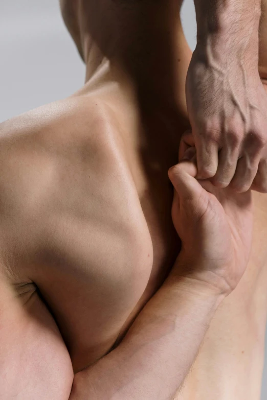 a man holding the shoulder of another man, massurrealism, partially cupping her hands, houdini sidefx, cysts, neck zoomed in