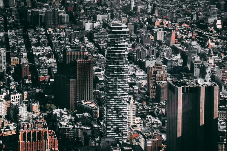 a view of a city from the top of a building, pexels contest winner, modernism, new york buildings, view from helicopter, stacked image, single building