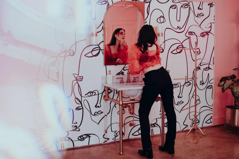 a woman that is standing in front of a mirror, by Olivia Peguero, trending on pexels, maximalism, 🦩🪐🐞👩🏻🦳, making out, background image, looking around a corner