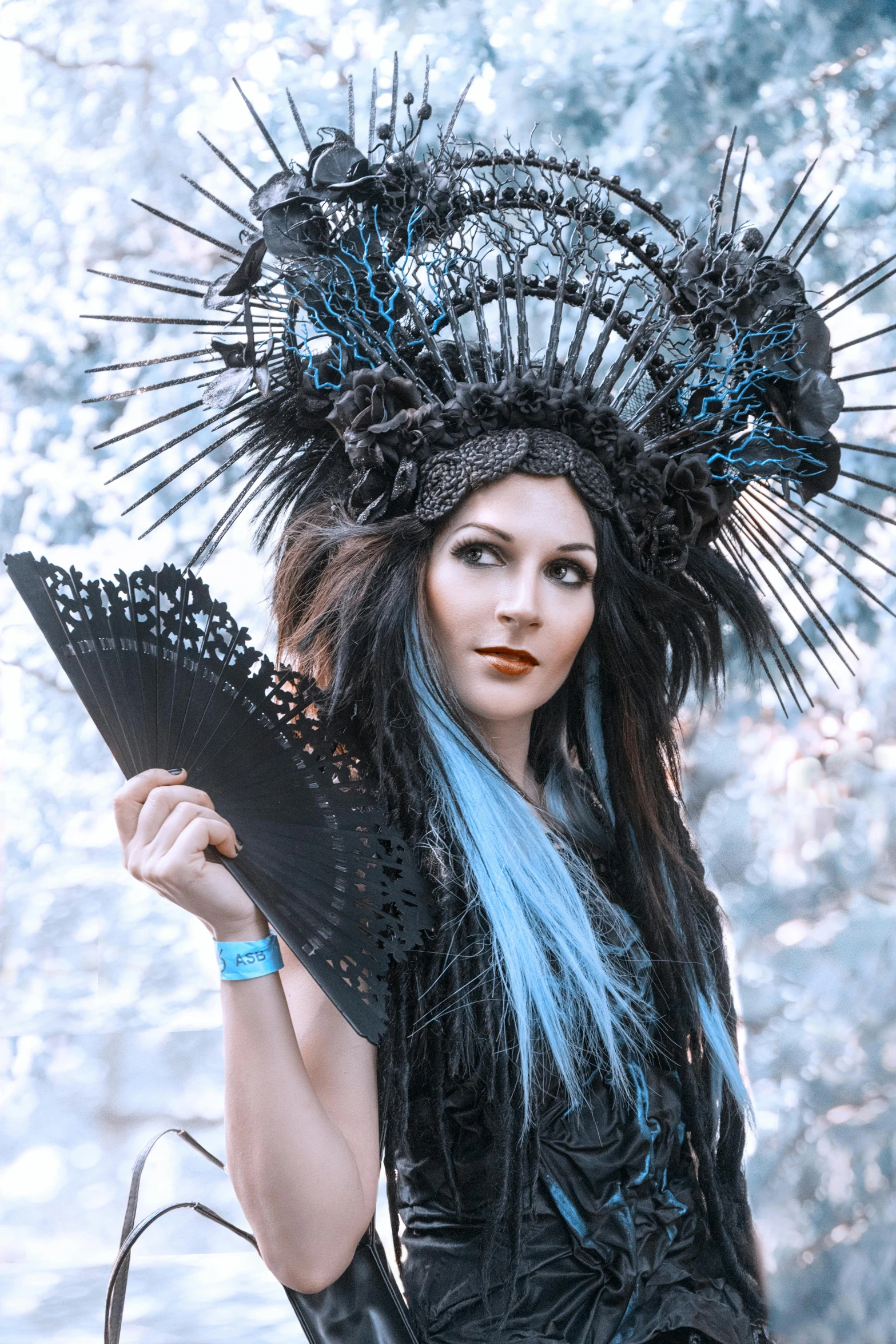 a woman with blue hair holding a fan, inspired by Edo Murtić, pexels contest winner, gothic art, bronze headdress, belle delphine, with black vines, 5 0 0 px models