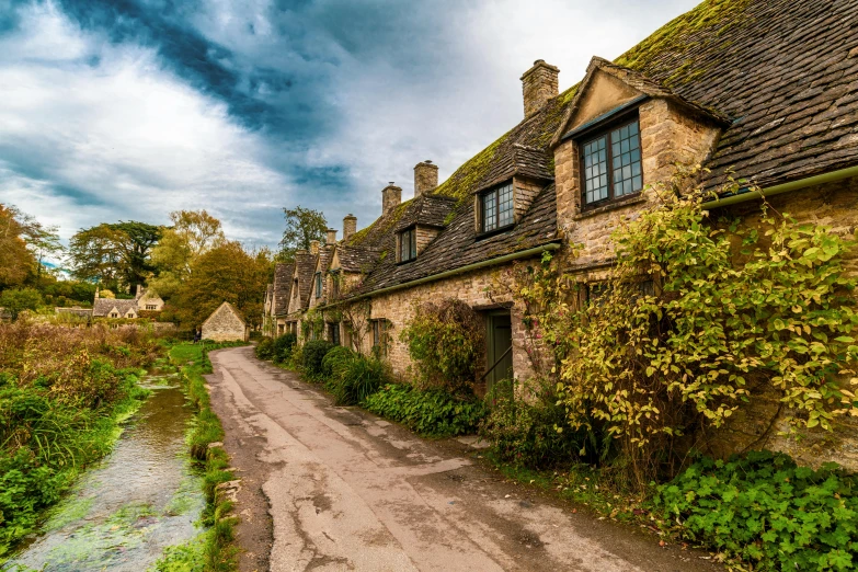 a dirt road in the middle of a village, pexels contest winner, renaissance, brockholes, several cottages, vine covered, harry potter series setting