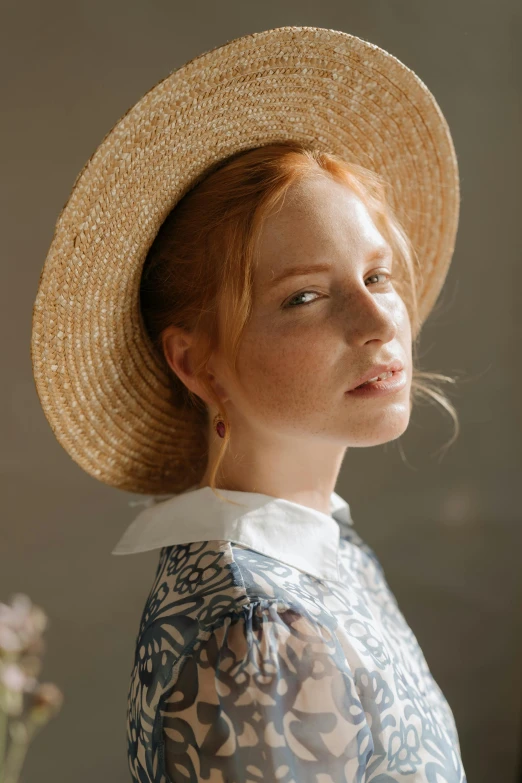 a close up of a person wearing a hat, a portrait, by Anna Boch, trending on pexels, renaissance, redhead girl, white straw flat brimmed hat, model posing, collar on neck