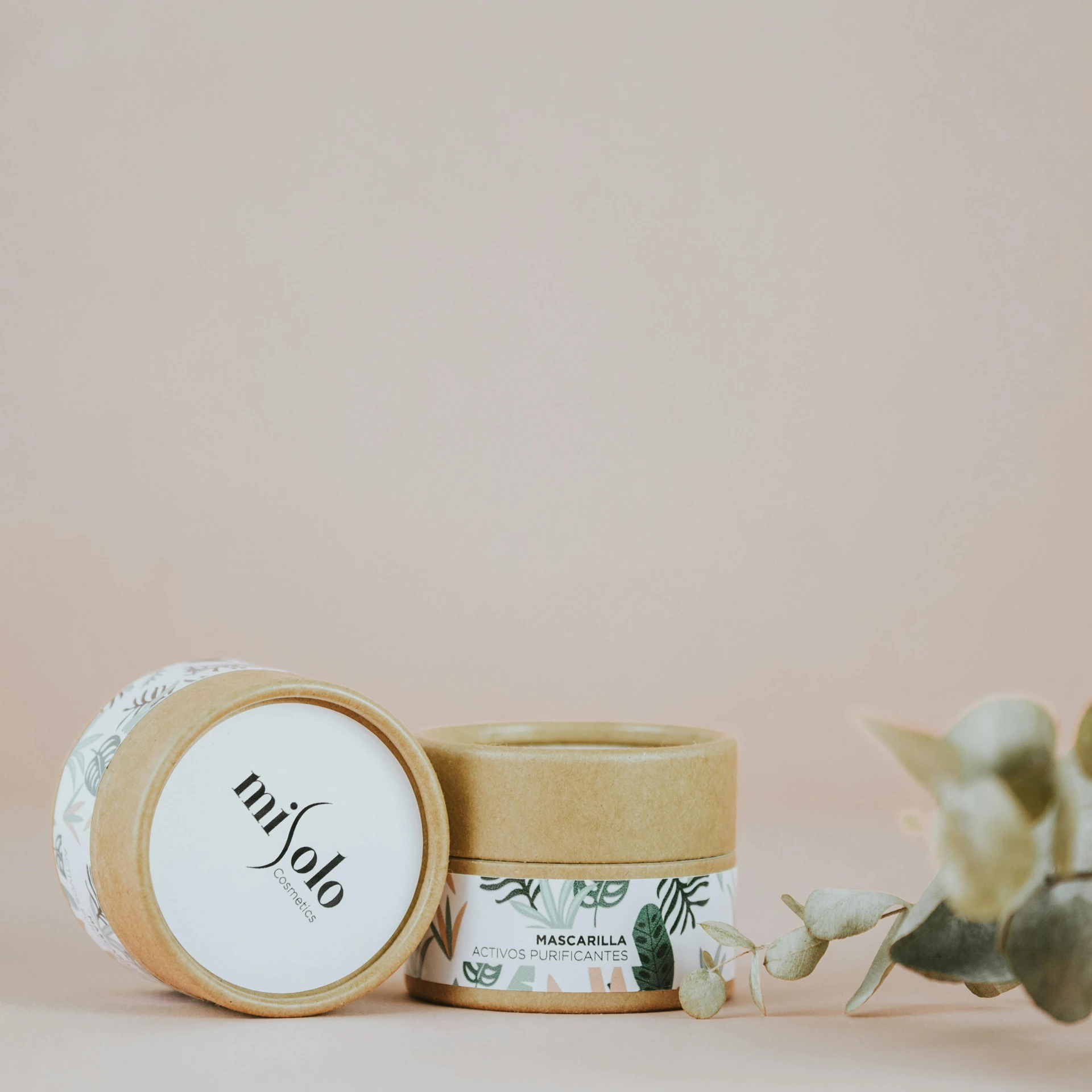 a jar of body butter next to a plant, inspired by Eden Box, mini model, mikko, plaster, round format