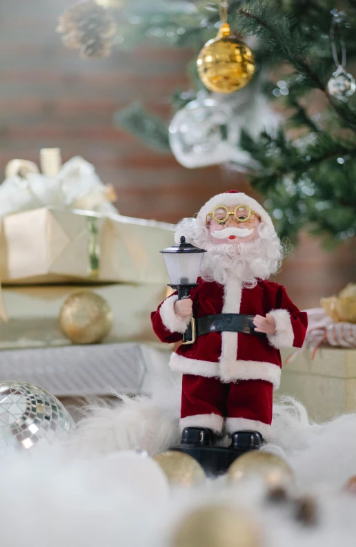 a santa claus figurine standing in front of a christmas tree, pexels, folk art, holding a lantern, bl, soft natural light, holding gift