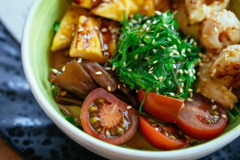 a close up of a bowl of food on a table, by Julia Pishtar, unsplash, mingei, veggies, square, sougetsu, made of glazed