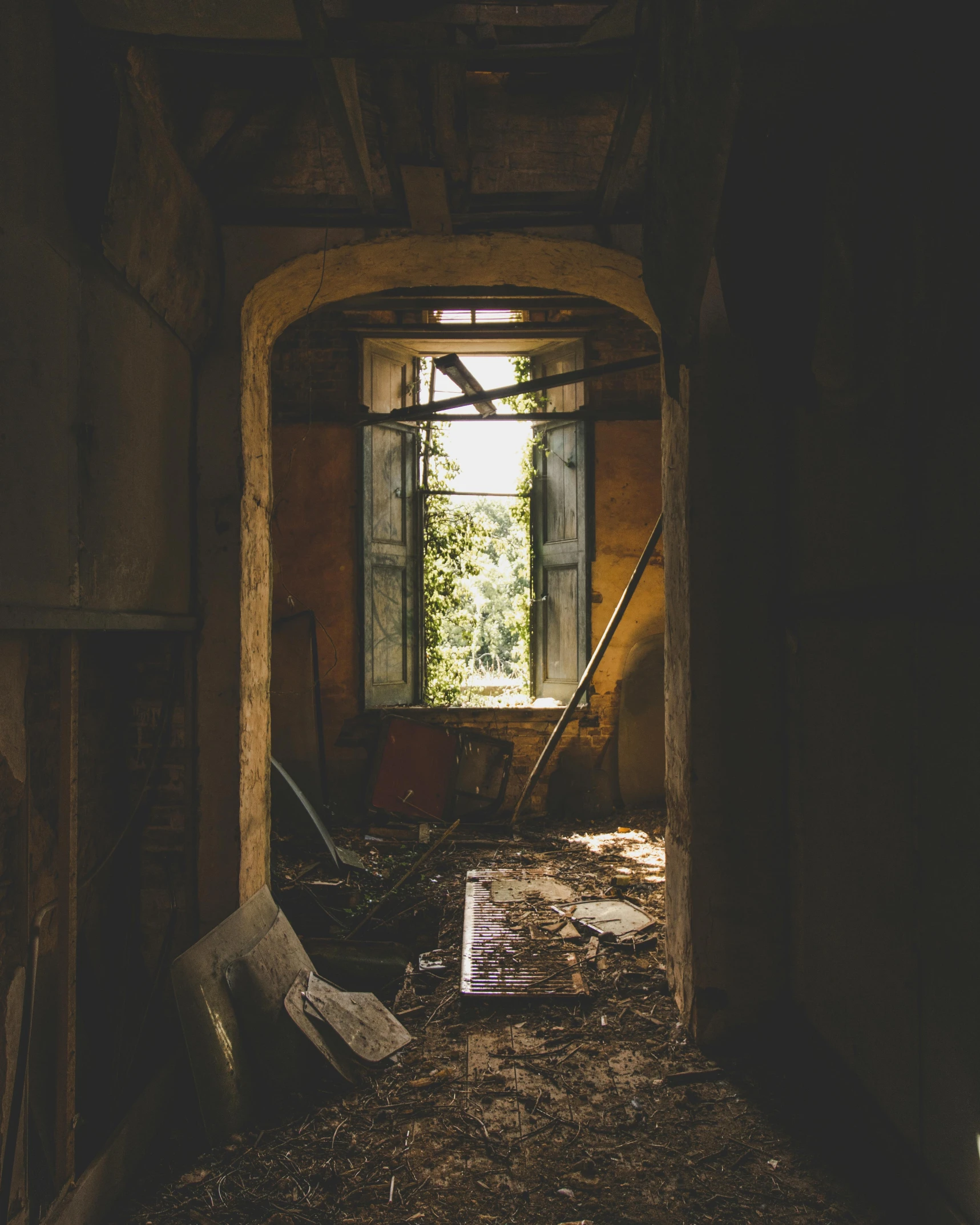 a doorway leading into a run down building, unsplash contest winner, renaissance, inside a messy room, decaying dappled sunlight, tourist photo, overlooking