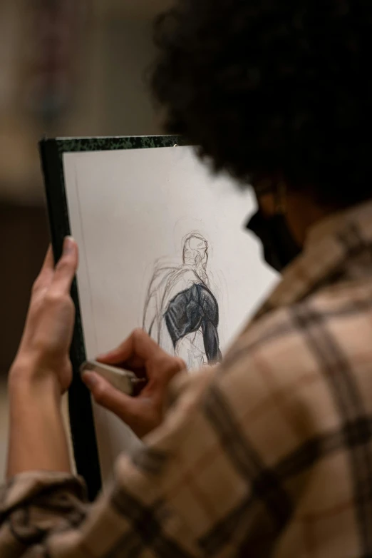 a woman is drawing a dress on a piece of paper, a charcoal drawing, inspired by Gregory Manchess, academic art, bob ross dressed as a superhero, pictured from the shoulders up, photo courtesy museum of art, cinematic detail