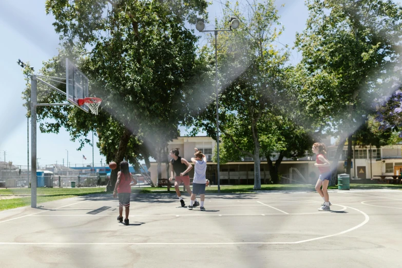 a group of people playing a game of basketball, a portrait, by Michael Goldberg, unsplash, central california, in a square, 8k quality, katey truhn